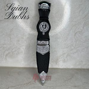 Sgian Dubh – a traditional Scottish knife with a distinctive design, featuring a detailed handle and blade, typically worn as part of Highland attire.